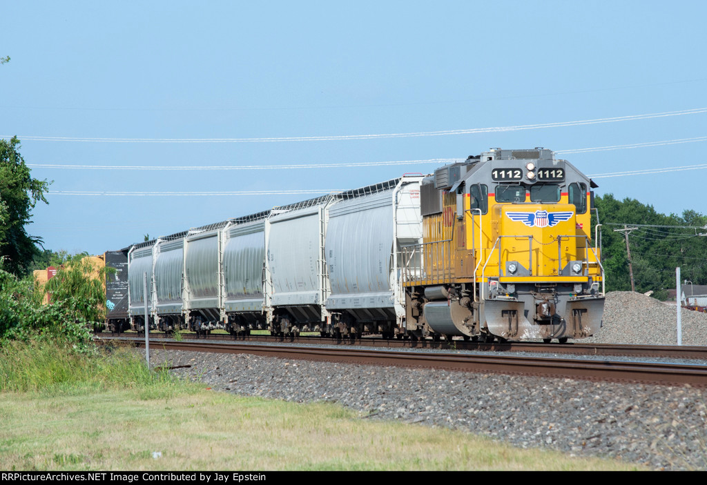 A local waits to go west